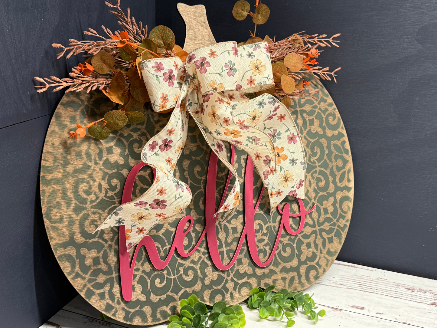 Fall Paint Party - Pumpkin Door Hanger, green stenciled pumpkin, angled view