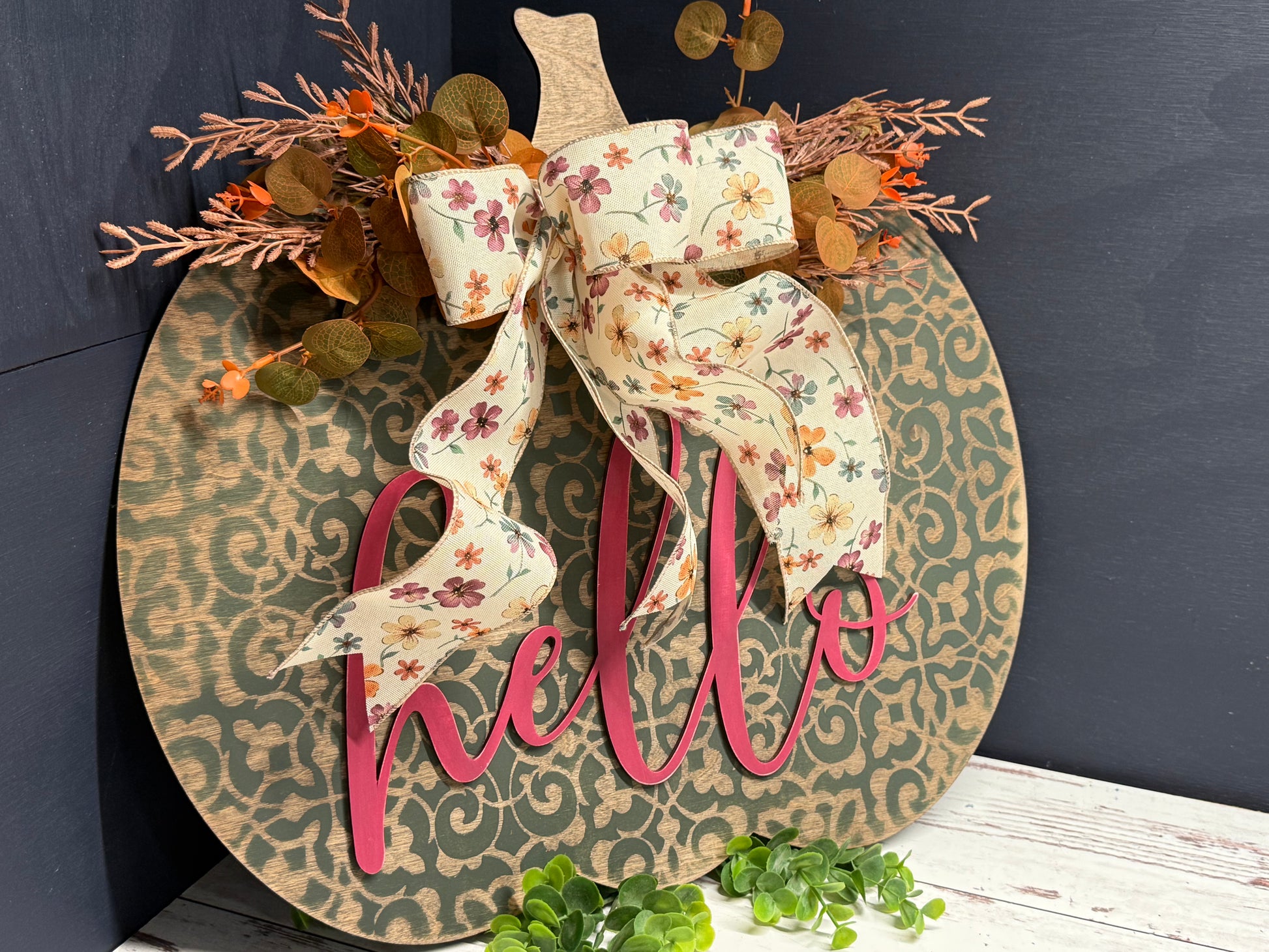 Fall Paint Party - Pumpkin Door Hanger, green stenciled pumpkin, angled view
